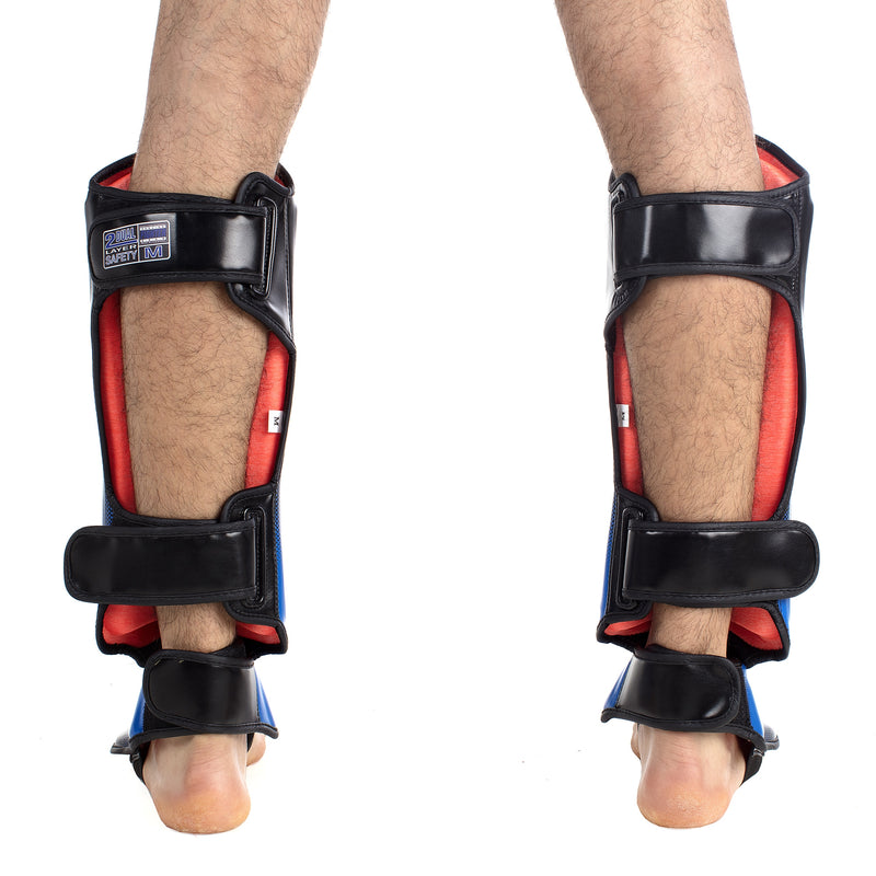 Fighter legg/vristbeskytter Tiburon sort/blå